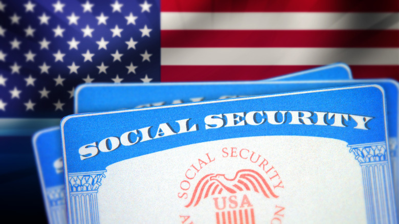 Social Security cards and American flag